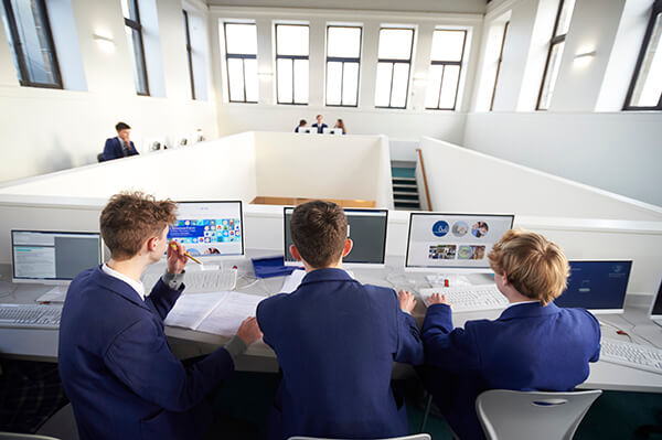 Boys using school computers